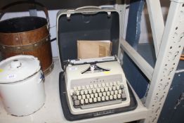 An Adler Junior 3 typewriter in fitted case