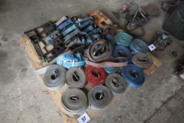Pallet containing large quantity of ratchet straps.