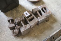 Various 56lb and other weights.
