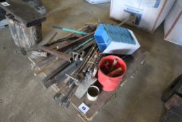 Pallet containing quantity of long handled tools.