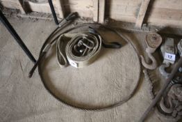 Lifting strap, shackles and wire hawser.