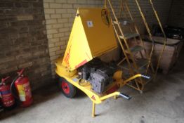 Treebusta petrol driven woodchipper.