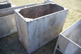 Riveted galvanised water tank.