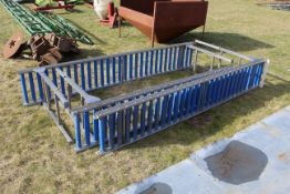 3x sections of stainless steel roller table.