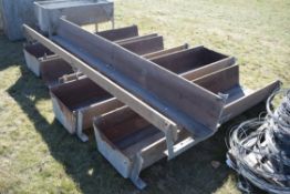 Various cattle feed manger sections.