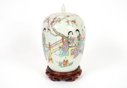 A Chinese baluster vase and lid, decorated figures in a garden setting and calligraphy, raised on