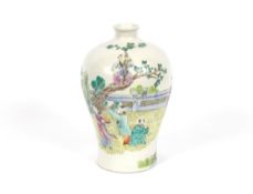 A Chinese baluster vase, decorated with figures in a garden, 30cm high