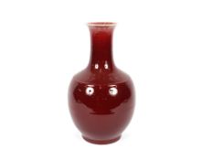 A Chinese Sang de Boeuf baluster vase, 44cm high