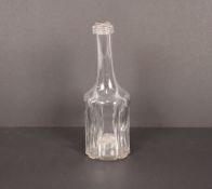 A mid 18th Century Cruciform glass bottle, with triple annulated collar, 22cm high AF