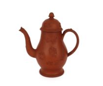 A 18th Century Staffordshire red stoneware coffee pot and cover,  of baluster form with raised