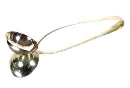 A George II Old English pattern soup ladle, having family crest, maker probably Gabriel Sleath,