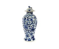 An antique Chinese baluster vase, and associated cover having all over floral decoration of birds