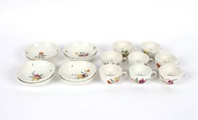 A Hague porcelain part tea set, comprising eight floral decorated cups and saucers, underglaze