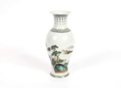 A Chinese baluster vase, having scenic decoration of pagodas and river and calligraphy, 26cm high