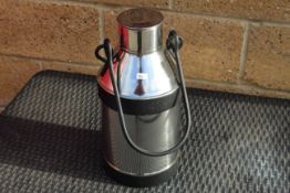 Stainless steel milkchurn. V