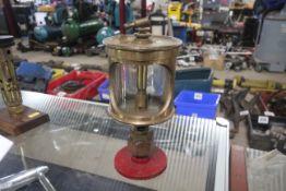 A drip feed oil lubricator