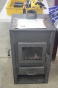 Blist woodburning stove with back boiler.