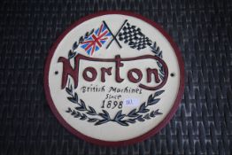 Round cast Norton sign. V
