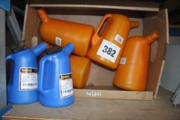 4x 2L oil jugs (new) and 2x 1L oil jugs (new). V
