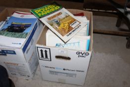 Box of Power Farming magazines.