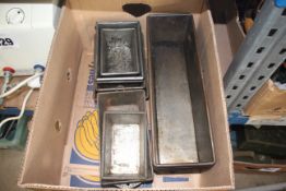 Box of assorted parts trays.