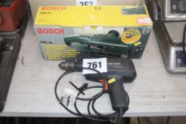 Bosch PBS60 belt sander and Black & Decker BD134V electric drill.