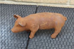 Small cast iron pig. V