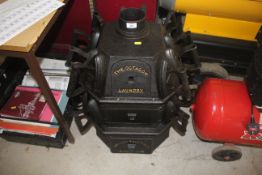 'The Octagon Laundry Stove' a cast iron three tier solid fuel laundry stove and 17 various flat