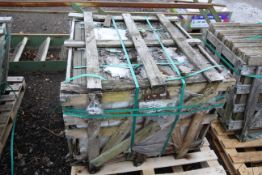 Damaged stillage of stone slabs. V