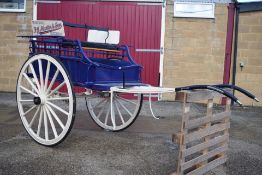 A vintage horse drawn butchers cart named to F. J. Martin & Sons Butchers. Used in recent times by