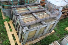 Stillage of narrow sandstone slabs. V