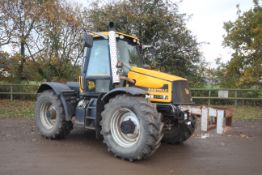 JCB Fastrac 2140 Smoothshift 4WD 4WS tractor. Registration AY05 AXA. Date of first registration 03/