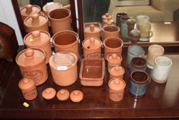 A quantity of Henry Watson Pottery storage jars an