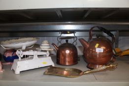 Two copper kettles; a brass coal shovel and a set