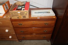 A mahogany chest fitted three drawers