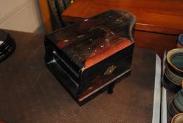 A lacquered piano shaped jewellery box