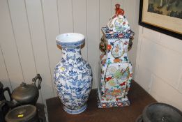 A blue and white Oriental baluster vase decorated