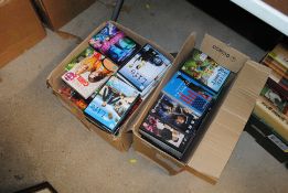 Two boxes of various DVDs
