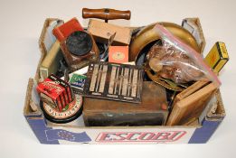 A box containing advertising packaging, various co
