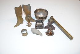A box containing vintage metal items including tra