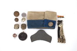 A mixed lot of German WWI buttons, badges etc. and