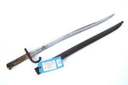 A French model 1866 brass hilted sabre bayonet with scabbard (blade dated 1868). This item can