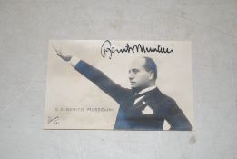 A picture on card of Mussolini, signed in ink with