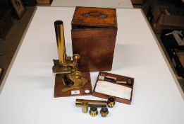 A compound microscope by J.H. Steward, 196 Strand,