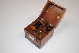 An oak cased electric shock treatment instrument