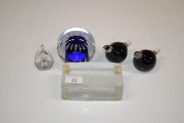 A pair of glass paperweights in the form of birds;