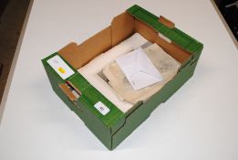 A box containing pencil drawings, ephemera and pri