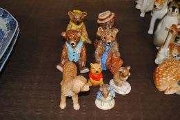 Four Beswick Teddy bears; two Royal Albert Beatrix