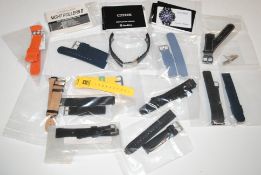 A box of various wrist watch straps to include Cas
