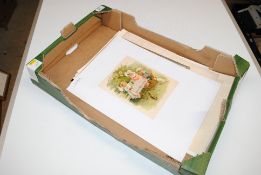 A box containing various drawings and paintings, p